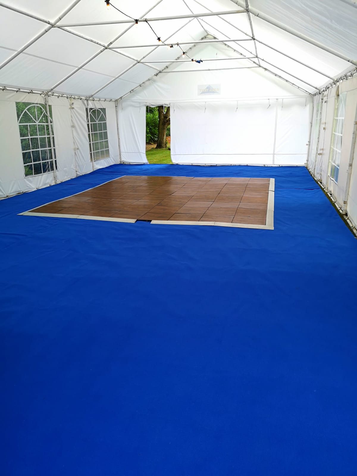 party tent with carpet and dance floor
